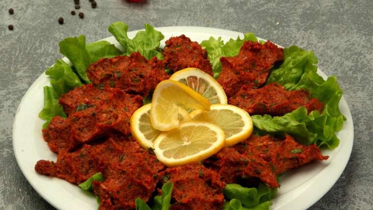 plate turkish chig kofte raw meatball with tomato paste spice 1